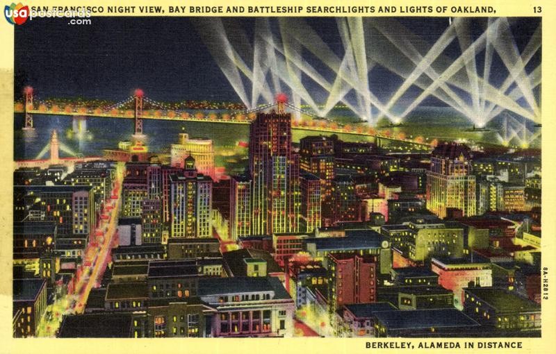 San Francisco Night View, Bay Bridge and Battleship Searchlights and Lights of Oakland