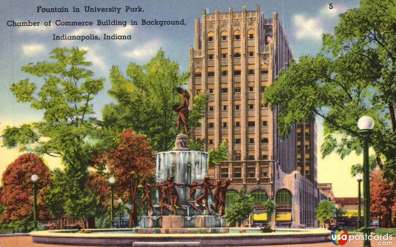 Fountain in University Park. Chamber of Commerce Building in Background