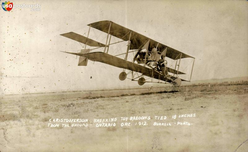 Pictures of Ontario, Oregon: Christofferson breaking toy baloons tied 18 inches from the ground (1912)